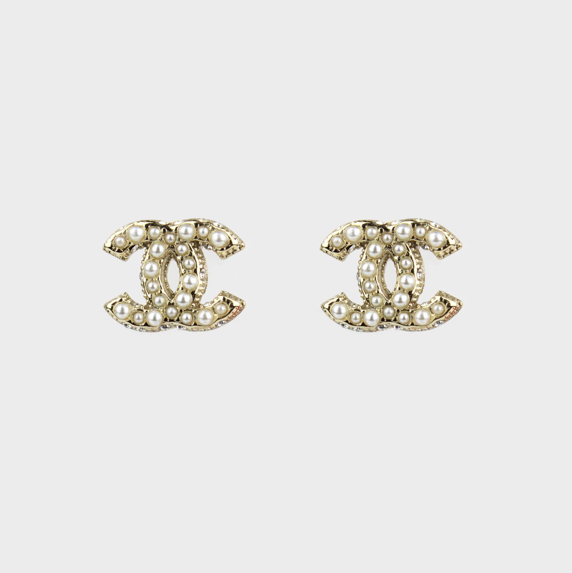aretes chanel oro