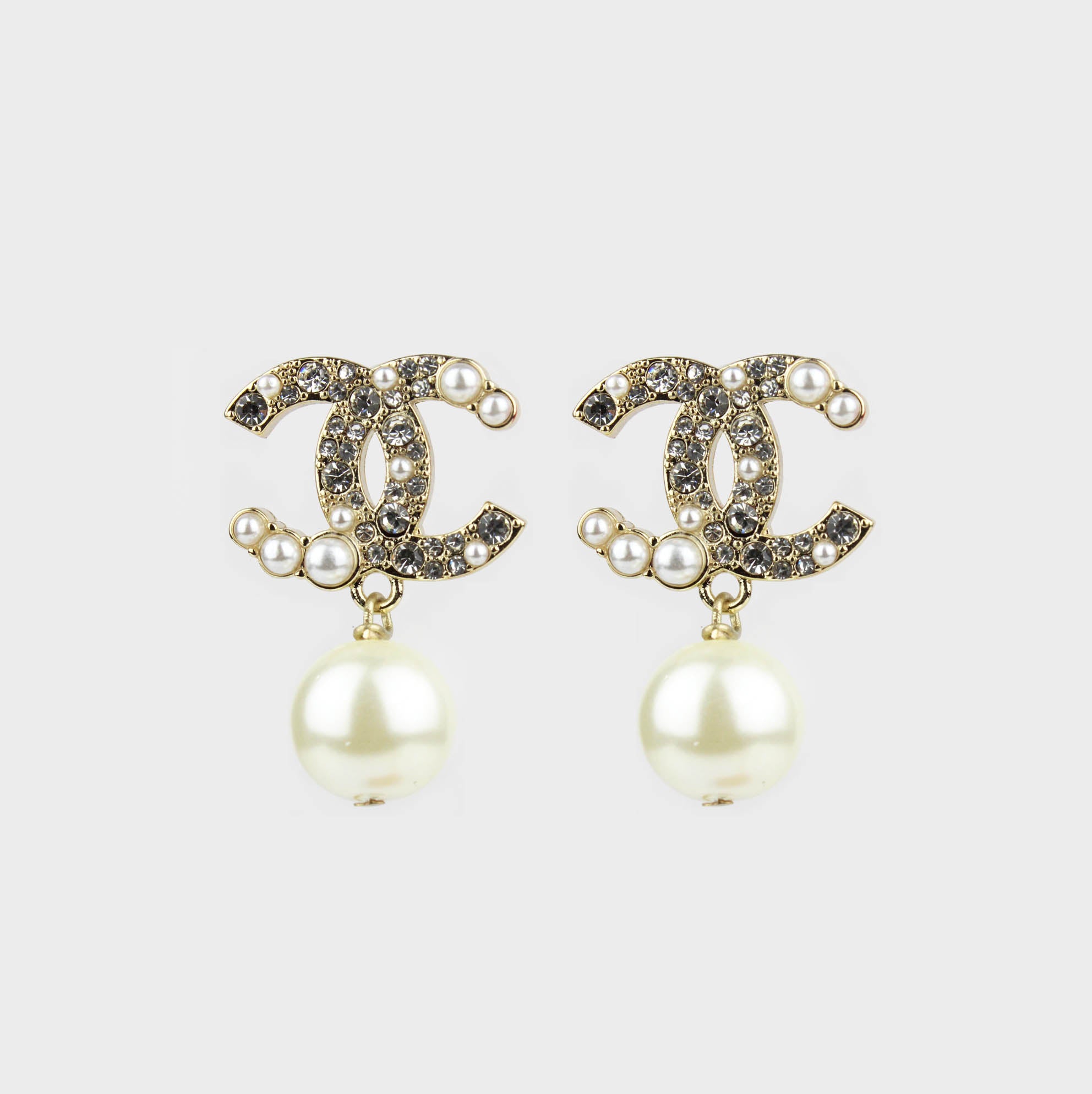aretes chanel con perla