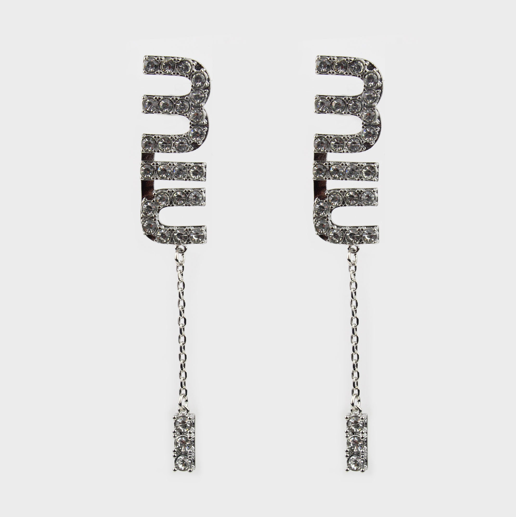 Miu Miu aretes mujer