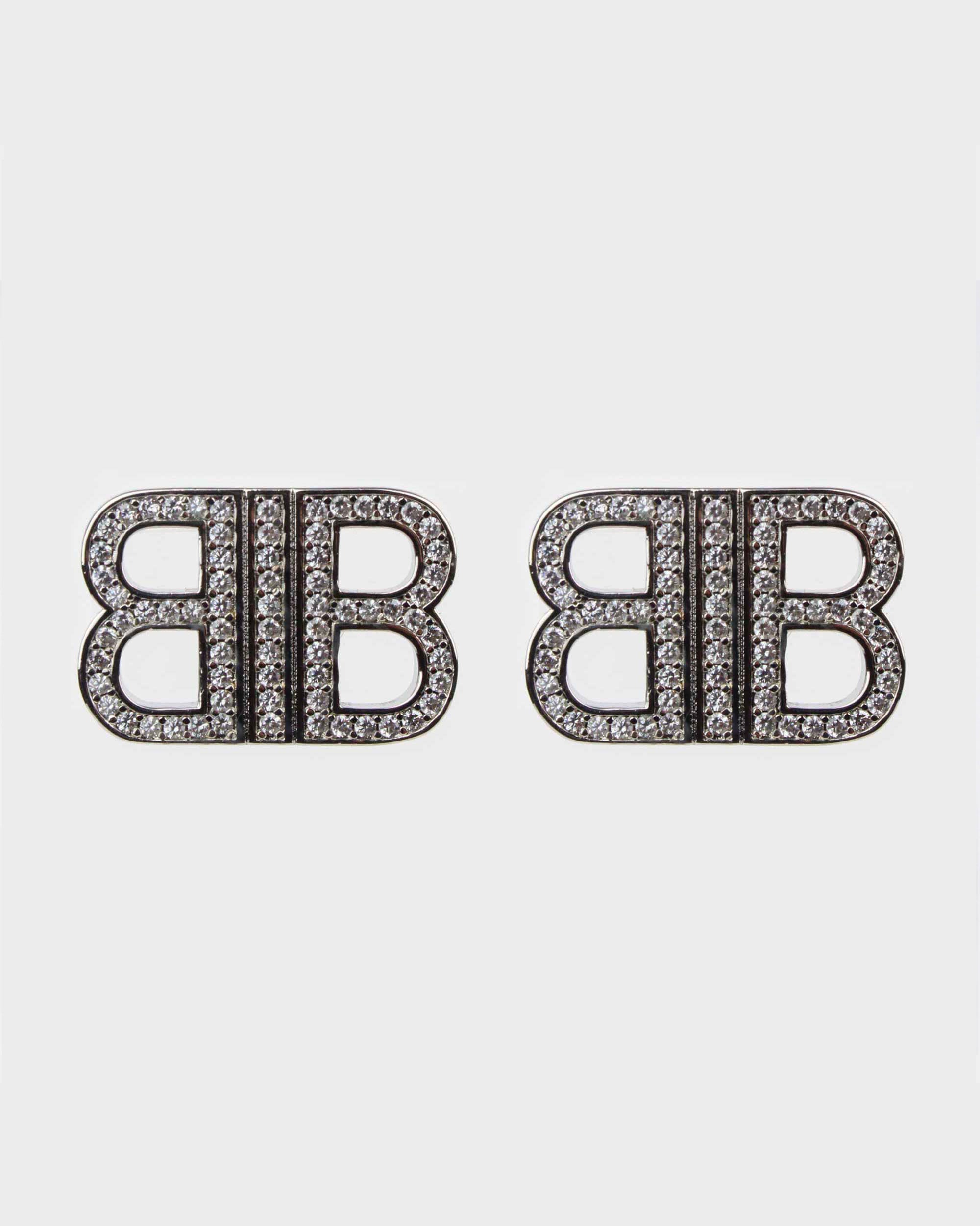 Balenciaga aretes con placa del logo