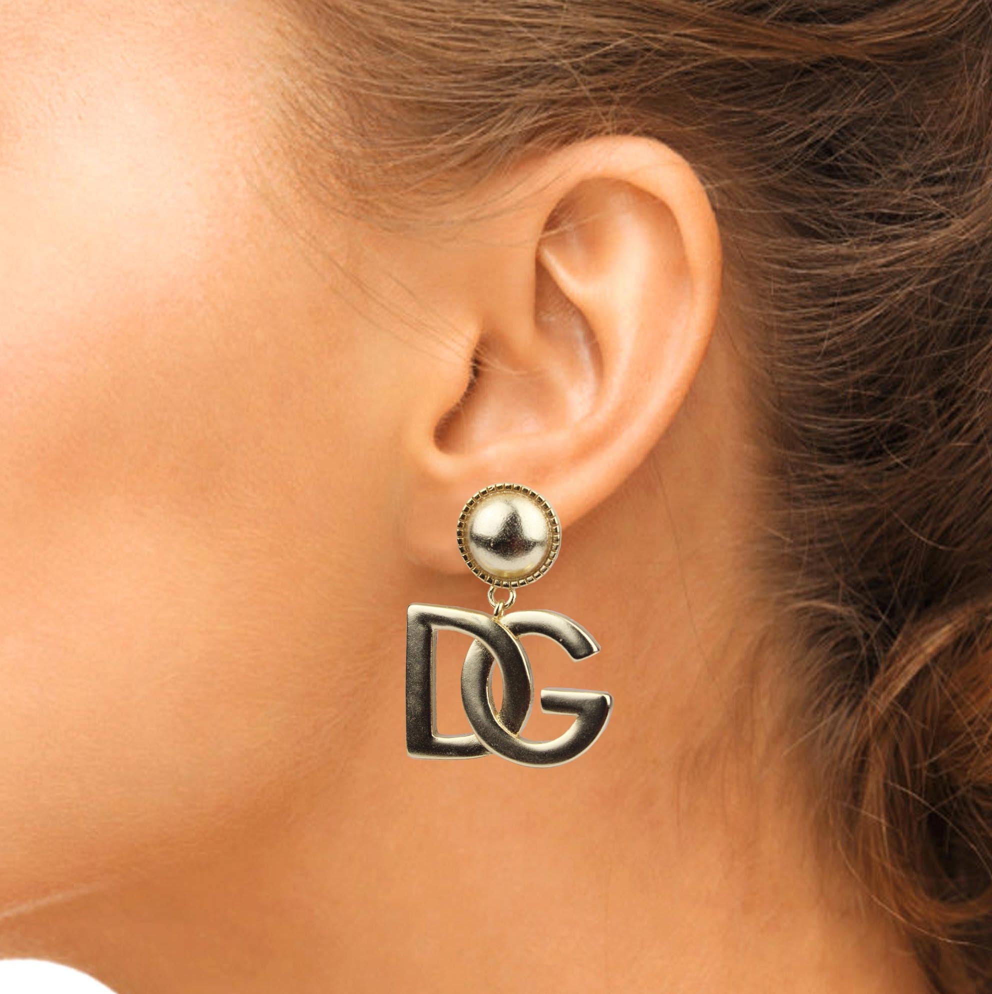 dolce gabbana aretes