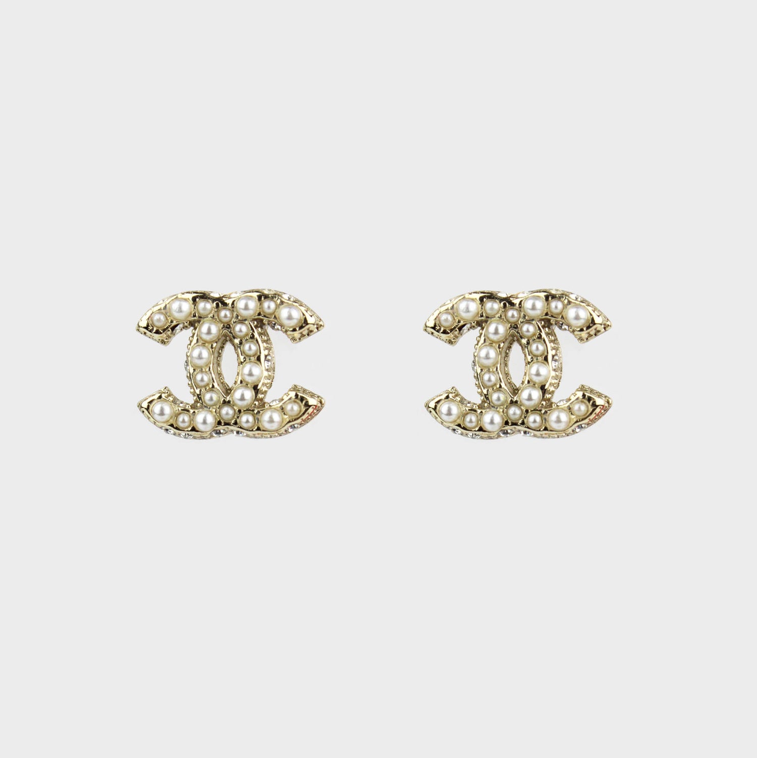 aretes chanel oro