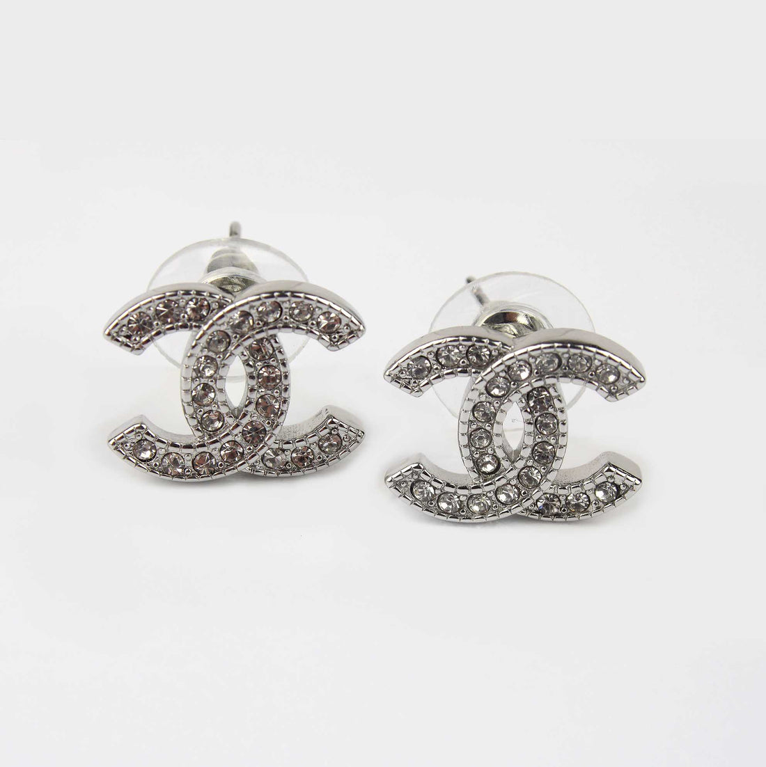 aretes chanel con piedras