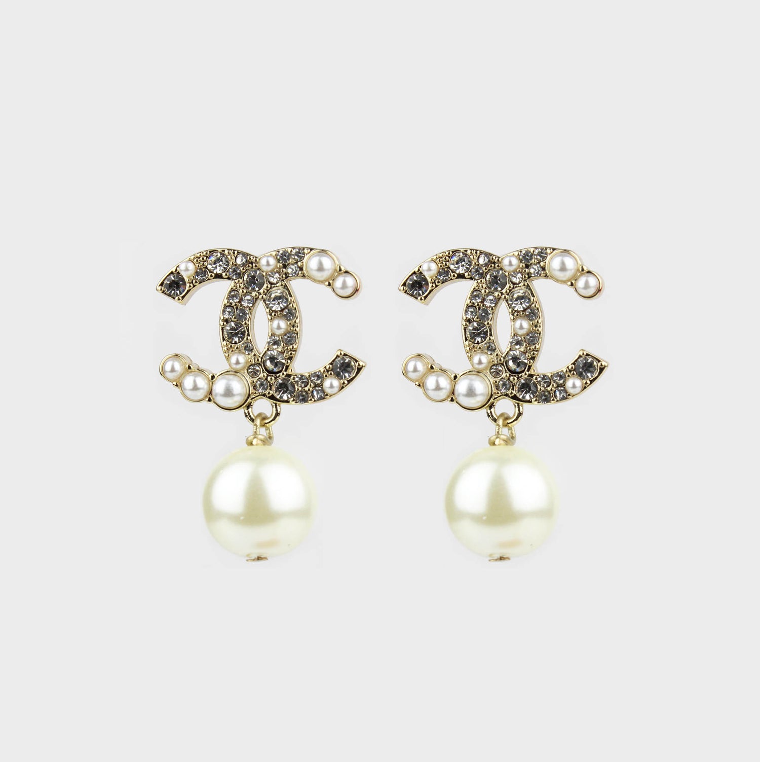 aretes chanel con perla