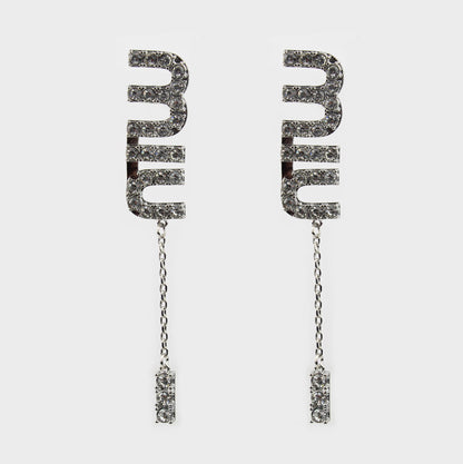 Miu Miu aretes mujer